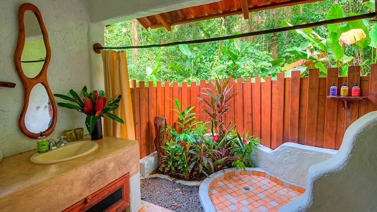 An open-air shower in the rainforest is pure luxury